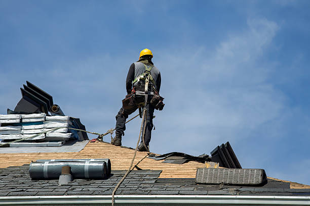 Professional Storm Damage Roof Repair technician working in Marathon, NY